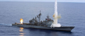 Aegis cruiser firing missiles