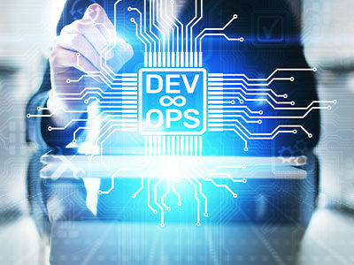 Image of businessman with the label "DevOps" on a clear board